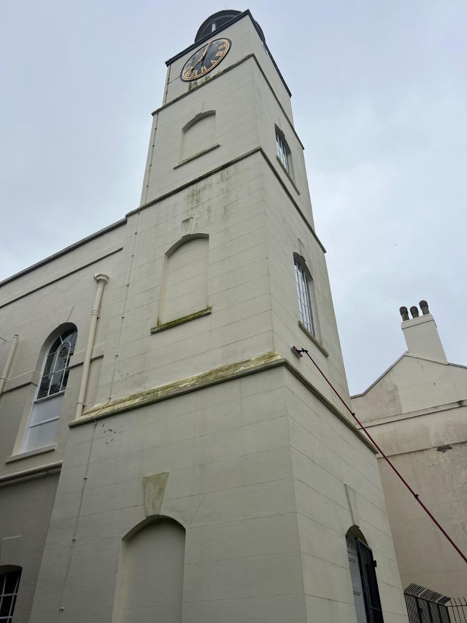 Working at height on the Hotham Park clock tower — DOFF heritage cleaning