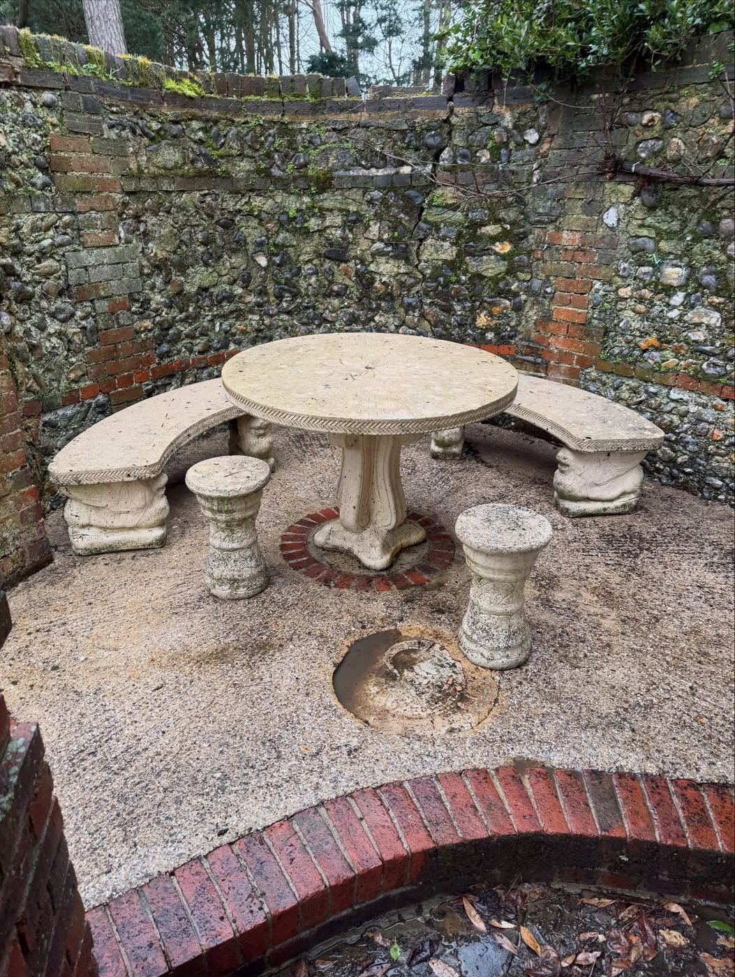 The same stone garden furniture cleaned and restored